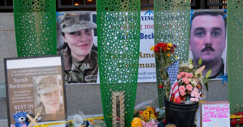 A makeshift memorial stands outside the Farragut West Metro station on Dec. 1, 2025, in Washington, D.C.