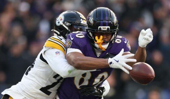 Joey Porter Jr. of the Pittsburgh Steelers breaks up a pass intended for Isaiah Likely of the Baltimore Ravens during the fourth quarter at M&T Bank Stadium on Dec. 7, 2025, in Baltimore, Maryland.