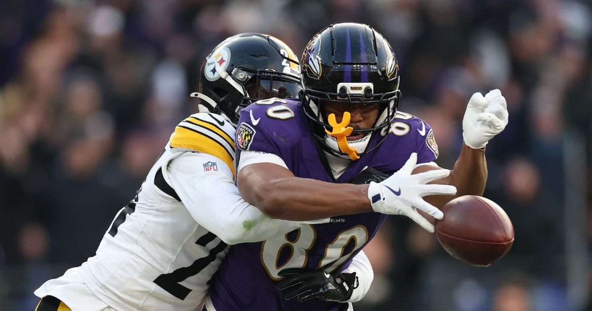 Joey Porter Jr. of the Pittsburgh Steelers breaks up a pass intended for Isaiah Likely of the Baltimore Ravens during the fourth quarter at M&T Bank Stadium on Dec. 7, 2025, in Baltimore, Maryland.