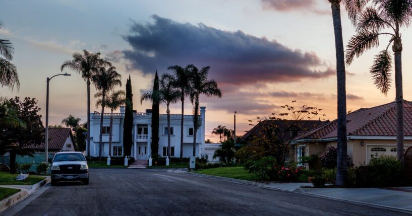 Dusk falls over one of the many mansions on Nov. 18, 2024, in Downey, California.