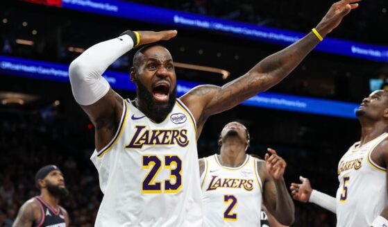 Lebron James of the Los Angeles Lakers looks for a foul call during the first half of a game against the Phoenix Suns at Mortgage Matchup Center on Dec. 14, 2025, in Phoenix, Arizona.