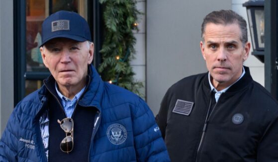 Former President Joe Biden and son Hunter Biden step out of a bookstore while shopping in Nantucket, Massachusetts, on Nov. 29, 2024.