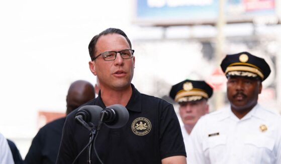 Pennsylvania Gov. Josh Shapiro speaks to members of the media near a collapsed portion of Interstate 95, caused by a large vehicle fire, in Philadelphia, Pennsylvania, on June 11, 2023.