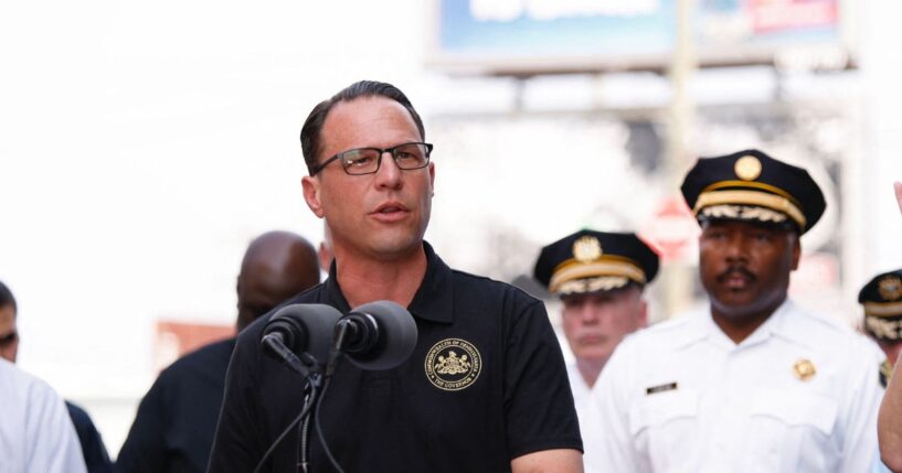 Pennsylvania Gov. Josh Shapiro speaks to members of the media near a collapsed portion of Interstate 95, caused by a large vehicle fire, in Philadelphia, Pennsylvania, on June 11, 2023.