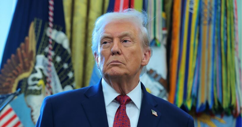 President Donald Trump listens during a ceremony for the presentation of the Mexican Border Defense Medal in the Oval Office of the White House on Dec. 15, 2025, in Washington, D.C.