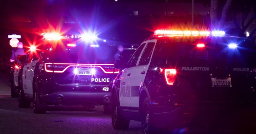 Fullerton Police Department units respond to the scene of a nighttime emergency on Dec. 11, 2022.