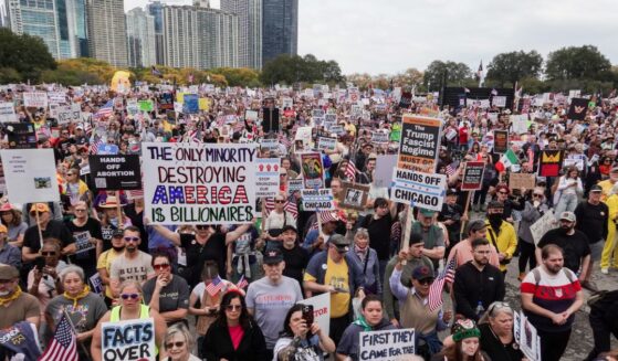 Protestors march in the second "No Kings" protest on Oct. 18, 2025, in Chicago, Illinois.