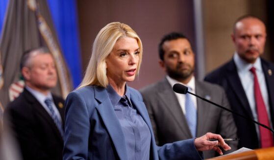 Attorney General Pam Bondi, accompanied by, FBI Director Kash Patel, FBI Deputy Director Dan Bongino, and FBI Washington Field Office Assistant Director in Charge Darren Cox, speaks during a news conference on an arrest of a suspect in the Jan. 6 pipe bombing case at the Department of Justice on Dec. 4, 2025, in Washington, D.C.