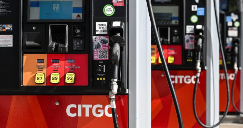 Gas pumps are seen at a CITGO gas station in Houston, Texas, on Dec. 2, 2025.
