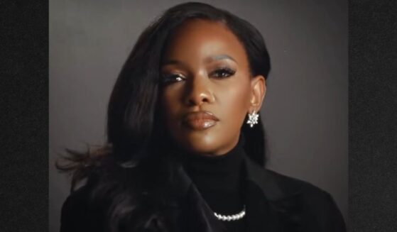 The bizarre ad features nothing but a shot of Crockett with clips of President Donald Trump saying negative things about her.