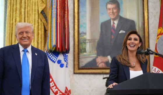 President Donald Trump listens as White House Presidential Counselor Alina Habba delivers remarks before being sworn in as the interim U.S. Attorney for New Jersey March 28 in the Oval Office at the White House in Washington, D.C.