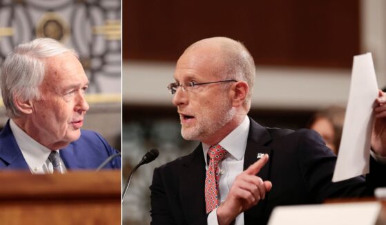 Massachusetts Democratic Sen. Ed Markey, left, was eager for FCC Commissioner Brendan Carr, right, to stop reading aloud the letter Markey had written in 2018.