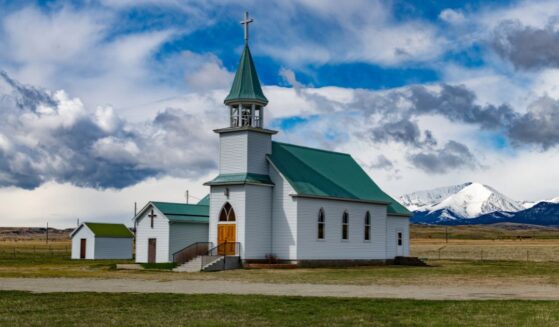 A picturesque church sits near the foot of Crazy Mountains outside of Big Timber, Montana.