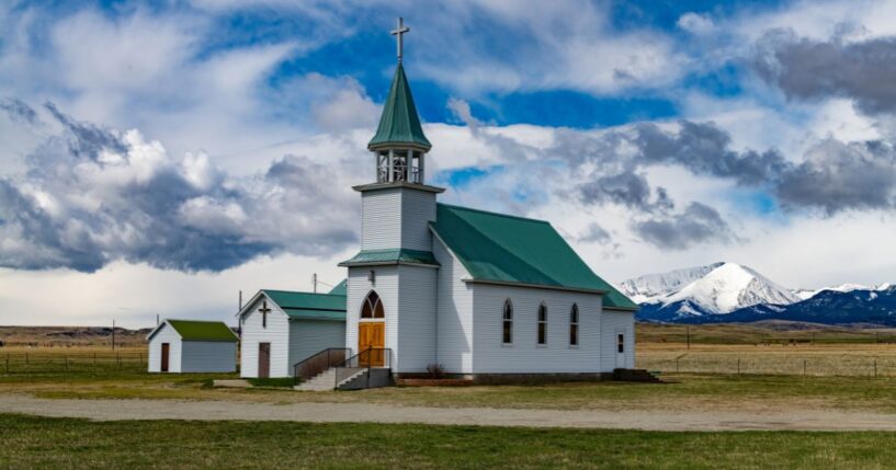 A picturesque church sits near the foot of Crazy Mountains outside of Big Timber, Montana.