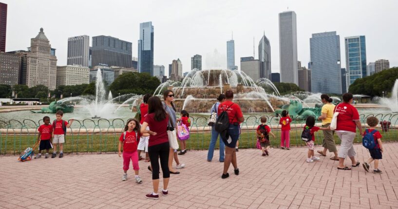 A group of preschool children walk around Buckingham Fountain in Grant Park in downtown Chicago on July 22, 2010.