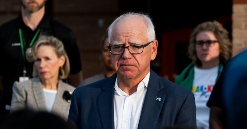 Minnesota Gov. Tim Walz speaks to media outside Deerwood Elementary in Eagan, Minnesota, on Sept. 2, 2025.