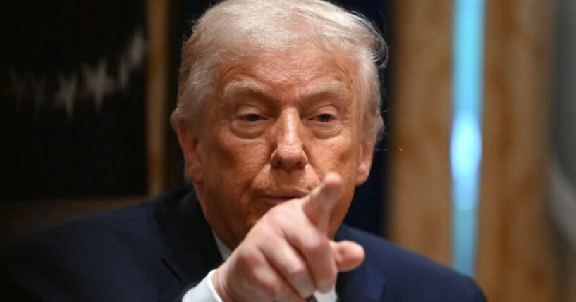 President Donald Trump points during a roundtable event in the Cabinet Room of the White House in Washington, DC on Dec. 8, 2025.