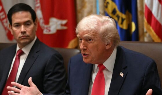 President Donald Trump speaks next to Secretary of State Marco Rubio during a meeting in the Cabinet Room of the White House on Dec. 2, 2025.