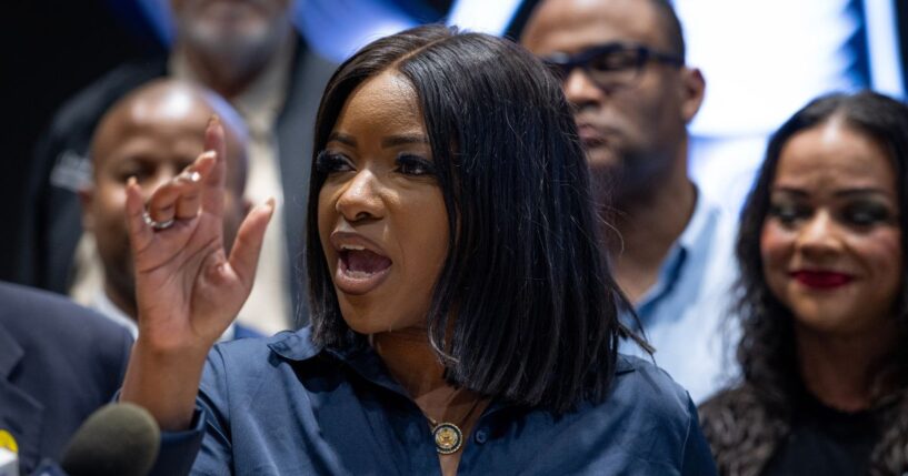 Rep. Jasmine Crockett (D-TX) speaks to reporters at a news conference in Warrenville, Illinois, on Aug. 4, 2025.
