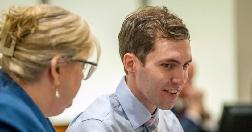 Tyler Robinson, the man accused of murdering conservative Charlie Kirk, shows a smile during a hearing in Provo, Utah, on Dec. 11, 2025.