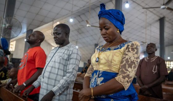 Catholics pray inside Saint Michael's Cathedral during a Sunday service in Minna on Nov. 30, 2025.