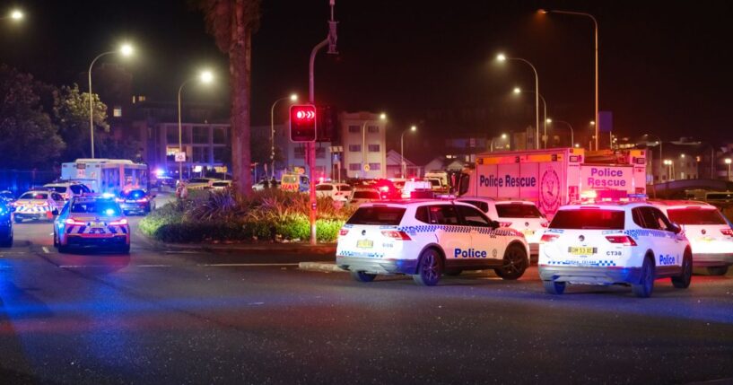 Police cars were seen parked at the scene of a mass shooting that took place at Bondi Beach on Dec. 14, 2025 in Sydney, Australia.