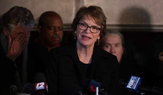 Brown University President Christina Paxson answers journalists' questions during a news conference after a shooting occurred on campus in Providence, Rhode Island, on Dec. 13, 2025.