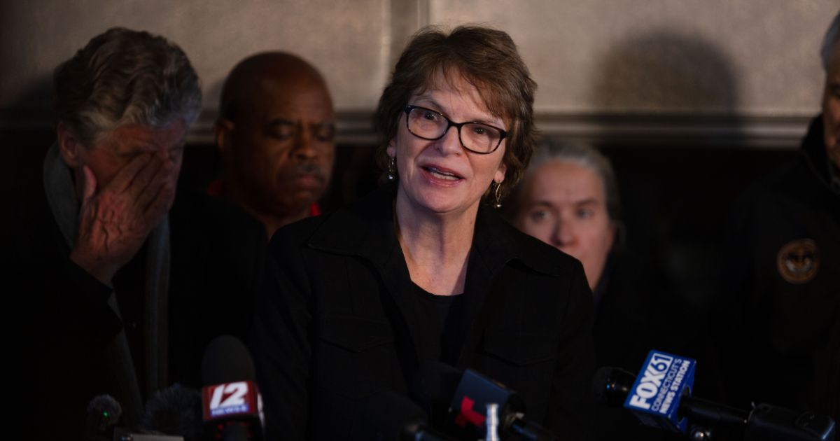 Brown University President Christina Paxson answers journalists' questions during a news conference after a shooting occurred on campus in Providence, Rhode Island, on Dec. 13, 2025.