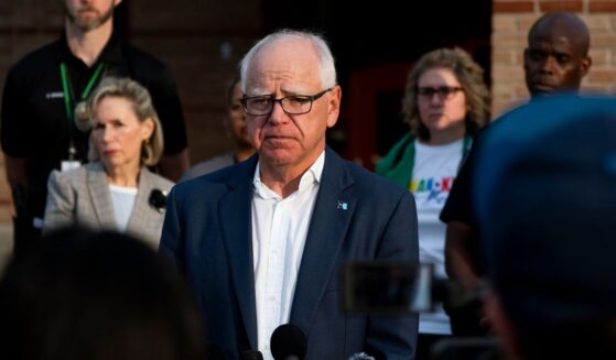 Minnesota Gov. Tim Walz speaks to journalists at Deerwood Elementary in Eagan, Minnesota, on Sept. 2, 2025.