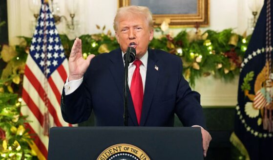 President Donald Trump addresses the nation Wednesday from the Diplomatic Reception Room of the White House in Washington, D.C.