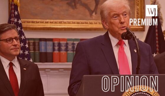 President Donald Trump and House Speaker Mike Johnson, a Louisiana Republican, are seen at a Dec. 2 White House event. The GOP stands to gain points with voters if the economy improves as predicted in 2026.