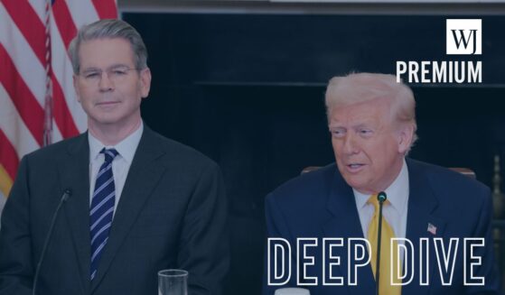 Treasury Secretary Scott Bessent and President Donald Trump look on during the White House Digital Assets Summit in the State Dining Room of the White House on March 7, 2025, in Washington, D.C.