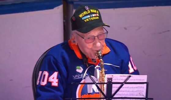 World War II veteran Dominick Critelli, 104, brought cheers from the crowd with his rendition of "The Star-Spangled Banner."