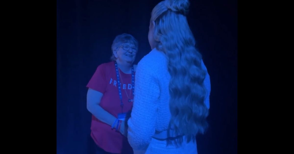 This X screen shot shows Erika Kirk greeting Jeanie Beeman at Turning Point USA's Americafest 2025 event.