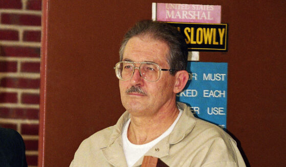 Former CIA agent Aldrich Ames leaves federal court after pleading guilty to espionage and tax evasion conspiracy charges on April 28, 1994, in Alexandria, Virginia.