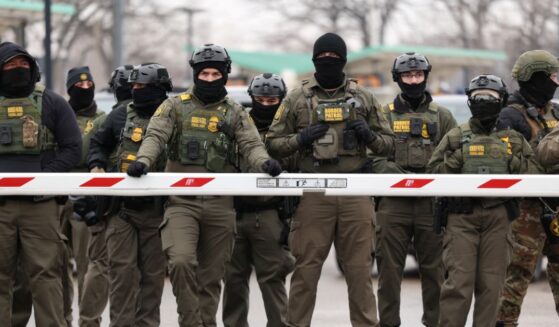 U.S. Border Patrol agents stand guard at the Bishop Henry Whipple Federal Building in Minneapolis, Minnesota, on Jan. 8, 2026.