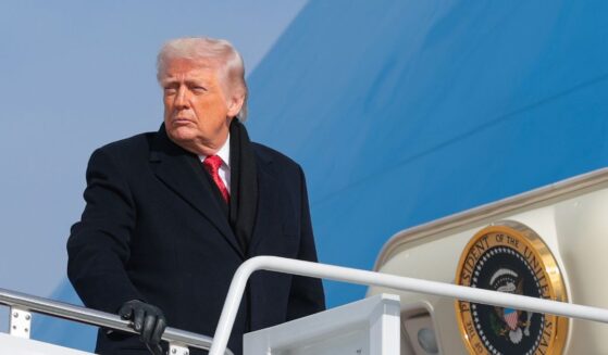 President Donald Trump boards Air Force One on Jan. 16, 2026, in Joint Base Andrews, Maryland.