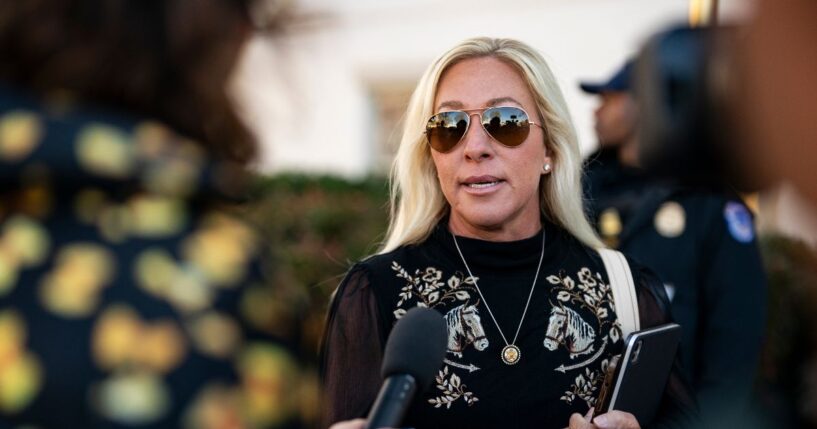 Rep. Marjorie Taylor Greene speaks to reporters while arriving at the Capitol Hill Club for a meeting of the House Republican Conference on March 25, 2025, in Washington, D.C.