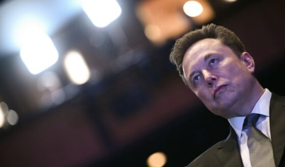 Elon Musk looks on as President Donald Trump speaks at the U.S.-Saudi Investment Forum at the John F. Kennedy Center for the Performing Arts in Washington, D.C., on Nov. 19, 2025.