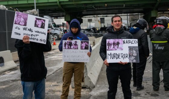 A few protestors hold signs in favor of Maduro's detention outside the MDC detention center on Jan. 5, 2026, in New York City.