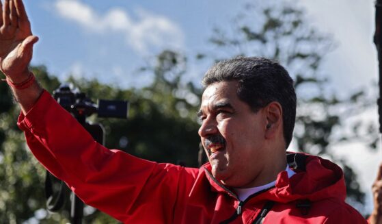 President Nicolás Maduro of Venezuela greets his supporters during a rally to commemorate Indigenous Resistance Day on Oct. 12, 2025, in Caracas, Venezuela.
