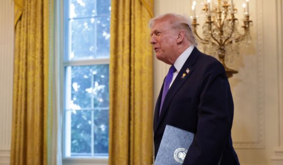 President Donald Trump arrives to a meeting with oil and gas executives in the East Room of the White House on Jan. 9, 2026, in Washington, D.C.