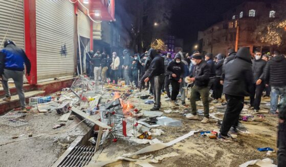 Iranians gather while blocking a street during a protest in Kermanshah, Iran, on Jan. 8, 2026.