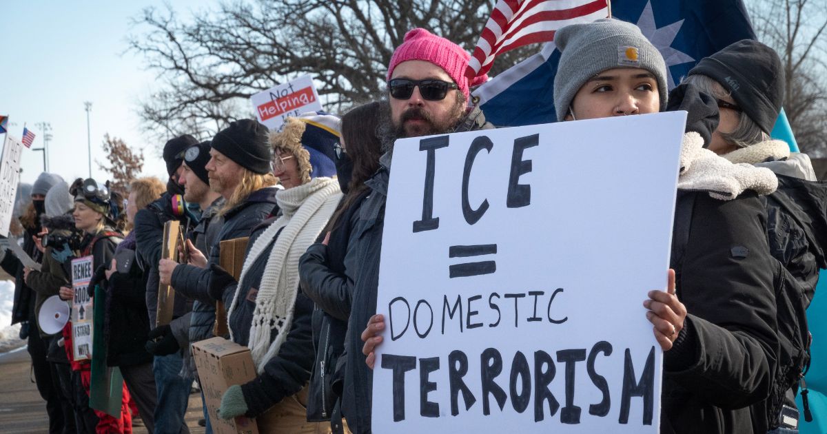 Demonstrators protest outside of the Bishop Henry Whipple Federal Building on Jan. 9, 2026, in Minneapolis, Minnesota.