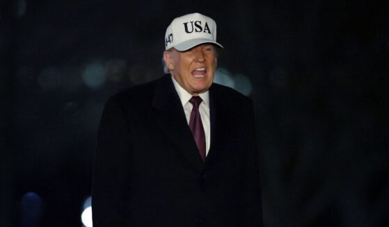 President Donald Trump walks on the South Lawn after he landed at the White House on Jan. 11, 2026, in Washington, D.C.