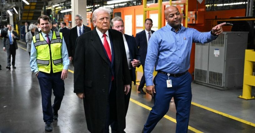 President Donald Trump, alongside Ford CEO Jim Farley, Treasury Secretary Scott Bessent, Ford executive chairman Bill Ford, and plant manager Corey Williams, tours Ford Motor Company's River Rouge complex in Dearborn, Michigan, on Jan. 13, 2026.