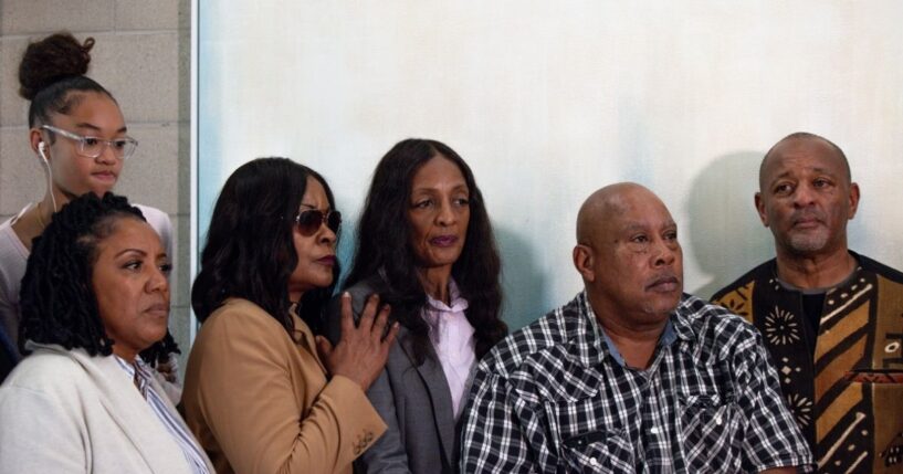 Family and friends of Keith Porter Jr. pose for a photo after a news conference on Jan. 5, 2026, in Studio City, California.