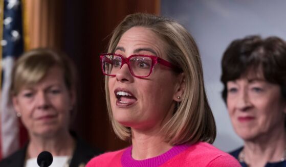 Now-former Sen. Kyrsten Sinema speaks to reporters following Senate passage of the Respect for Marriage Act at the U.S. Capitol in Washington, D.C., on Nov. 29, 2022.