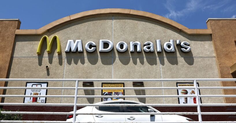 A customer waits in the drive thru lane at a McDonald's restaurant on July 22, 2024, in Burbank, California.