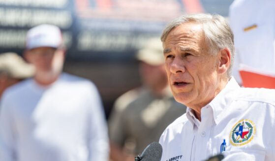 Gov. Greg Abbott speaks at a news conference on July 8, 2025, in Hunt, Texas.